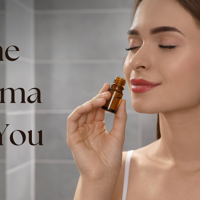 A woman smelling essential oils with the text "The Aroma of You," capturing the connection between scent and personality.